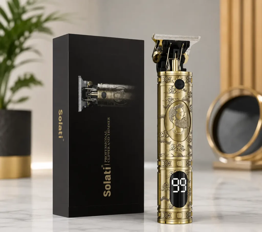 Solati professional gold hair clipper and trimmer set with black packaging displayed on a marble table.